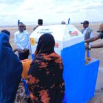 Representantes de la AECID, ONG Rescate y la comunidad de Yahas-Jemal durante la inauguración del nuevo sistema de agua potable alimentado con energía solar en Etiopía.